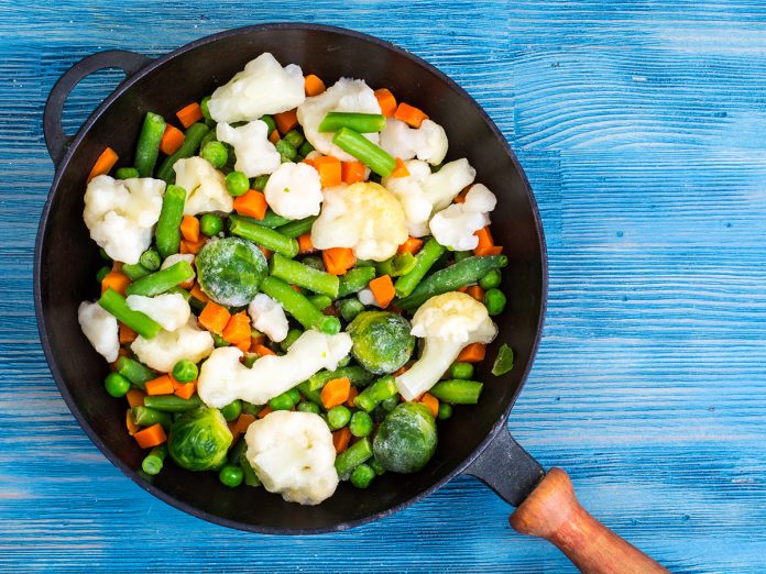 Pan with frozen vegetable mix for frying