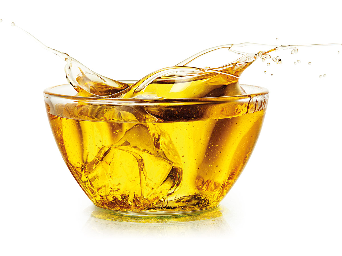 Cooking oil. Splash isolated on white. With clipping path.