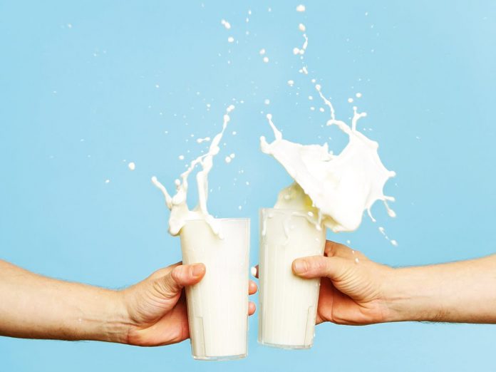 Toasting with Milk Glass
