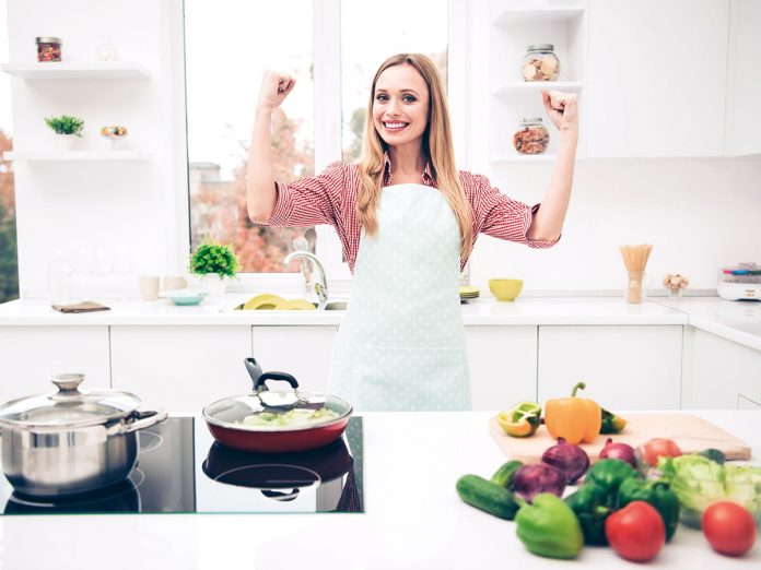 Close up photo beautiful she her lady adore cooking housewife super mom does best did all preparations delicious dish wear domestic apron shirt jeans denim outfit bright home kitchen indoors