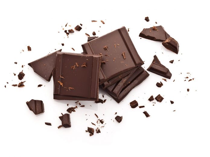 Chocolate pieces isolated on white background-Top view