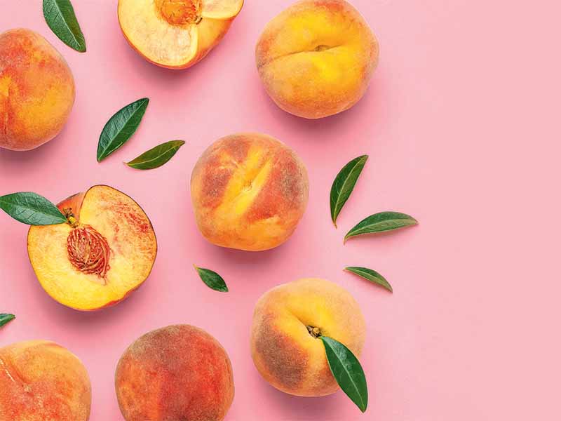 Summer fruit background. Flat lay composition with peaches. Ripe